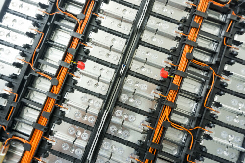 A lithium battery from the inside with orange cables