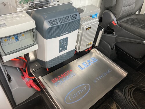 LEAB's Energy Unit is installed next to the driver's seat of a vehicle